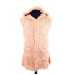 A brand-new, ladies, pale pink, rabbit fur gillet with hood