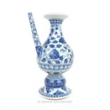 A Chinese, (Ming-style) blue and white, rain spotter with tall spout