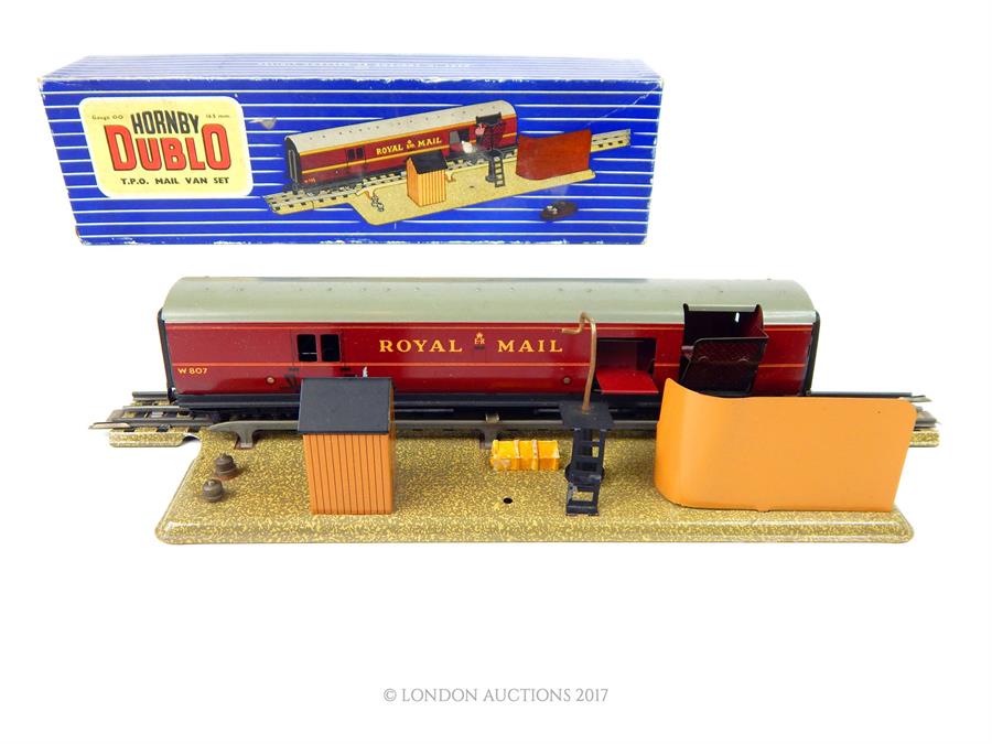 A vintage Hornby Dublo T.P.O. Mail van set with original box: featuring Royal Mail rail van and