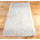 A small contemporary 100% polyester shaggy rug of silver hue