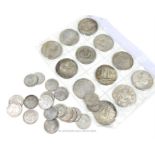 A collection of Chinese white metal coins