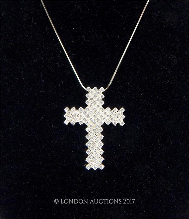 A boxed, Ernest Jones, sterling silver and white crystal cross pendant and chain - Image 3 of 3