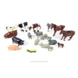 A collection of vintage farm toys: 18 various Britains toy lead farm figures, animals and some other