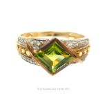 A stunning, 9 ct yellow gold peridot, citrine and diamond cocktail ring
