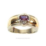 A 9 ct yellow and white gold, ruby-set ring