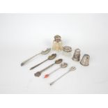 A collection of silver items including jars, spoons and cruets