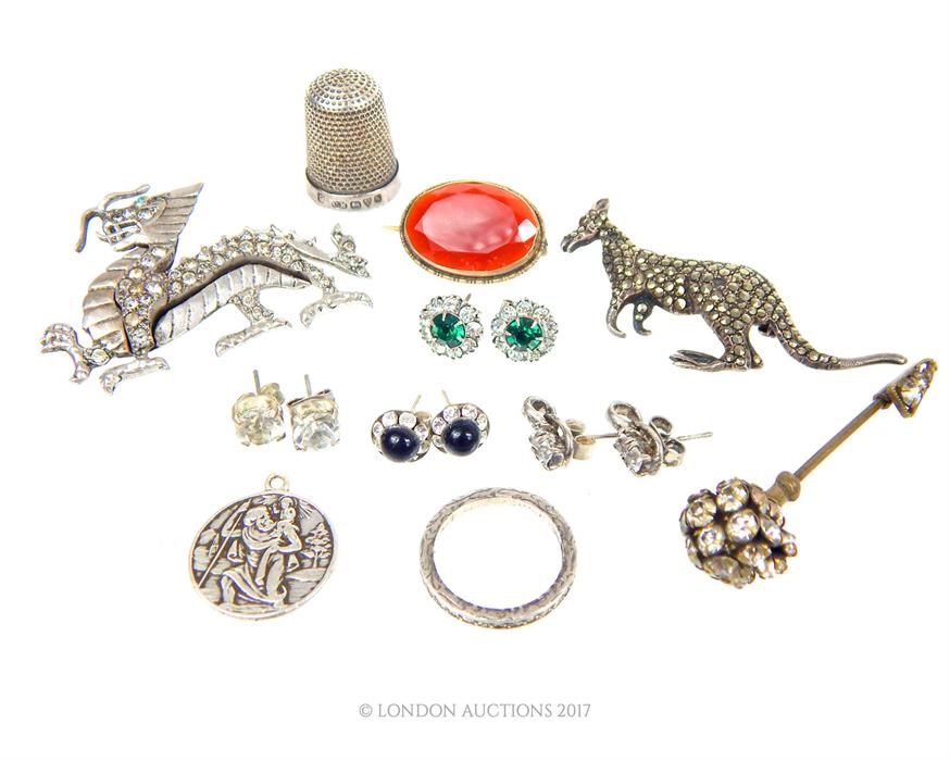 A collection of sterling silver and white metal items