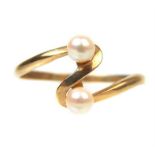 A 9 ct yellow gold, double pearl crossover ring