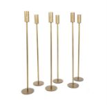 A set of six contemporary bronzed metal tea light holders