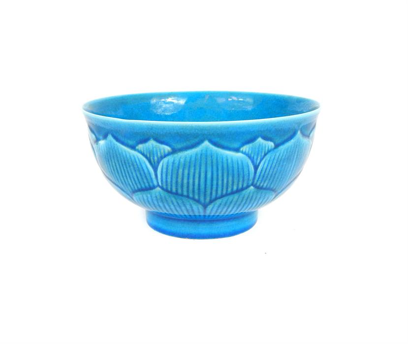 A Chinese, porcelain, rice bowl in a deep, blue, crackle-glaze