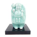 A Chinese celadon glazed porcelain figure of Hotei