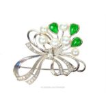 A stunning, boxed, Mikimoto, 14 ct white gold, diamond, cultured pearl and green stone brooch