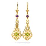 A pair of silver-gilt, drop earrings set with peridot and amethysts