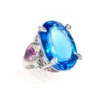 An impressive, 18 ct white gold, blue topaz, pink sapphires and diamond cocktail ring