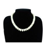 An (AAA++ grade) Baroque, coin-pearl necklace with 14 ct yellow gold clasp