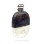 An Edwardian hallmarked sterling silver hip flask