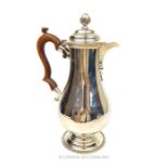 A sterling silver coffee pot