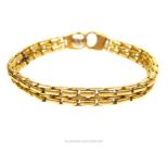 A chunky, 18 ct yellow gold, double-link bracelet