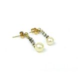 A pair of Edwardian, 9 ct yellow gold, diamond and pearl drop, stud, earrings