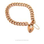 An Edwardian, 9 ct rose gold, chunky, curb-linked bracelet with padlock clasp