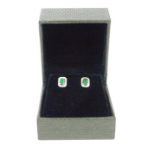 A pair of 18 ct white gold, diamond and emerald, cluster stud earrings