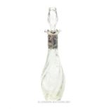 A late Victorian glass decanter with a sterling silver collar