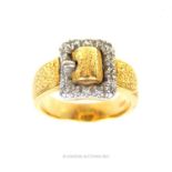 An 18 ct yellow gold, diamond buckle and belt ring