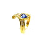 An 18 ct yellow gold, Ceylon, 'corn-flower blue' sapphire and diamond ring