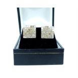 A pair of impressive, 14 ct white gold, large, pave diamond stud earrings (5 carats)