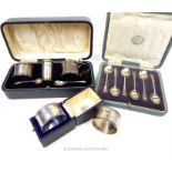 A collection of sterling silver items including a cased cruet set