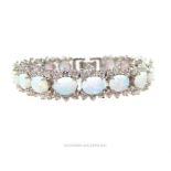 A sterling silver, opalite and white crystal bracelet