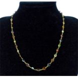 A 14 ct yellow gold and gem-set chain necklace