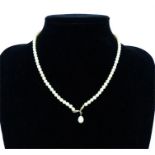 A cultured pearl drop necklace with a 9 ct yellow gold pendant fitting and clasp