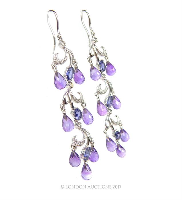 A boxed pair of 18 ct white gold, diamond, amethyst an iolite chandelier drop earrings - Image 2 of 2