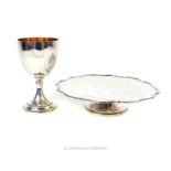 A sterling silver tazza by Mappin & Webb, Birmingham 1934 with a sterling silver goblet
