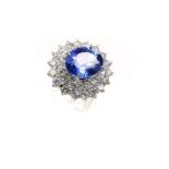 An 18 ct white gold, diamond and tanzanite, large, cluster ring