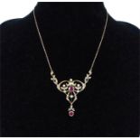 A 9 ct yellow gold, Art Nouveau-style, diamond and ruby necklace