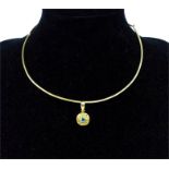 A 14 ct yellow gold, blue topaz pendant and necklace