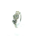 A stunning, boxed, Art Deco, platinum, three stone diamond ring