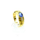 An Art Deco style, 18 ct yellow gold, diamond and sapphire ring