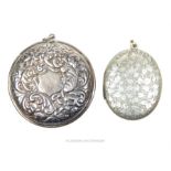 An early 20th century silver plated oval locket together with an Edwardian vesta case