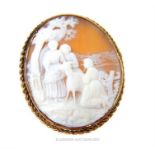A large, antique, 9 ct yellow gold mounted, oval, carved, cameo brooch/pendant