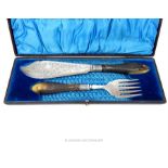 A pair of late Victorian cased silver plated fish servers