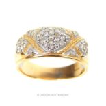 A fine, 18 ct yellow gold and white gold, diamond dress ring