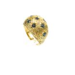 A 9 ct yellow gold, sapphire-studded, bombe cocktail ring