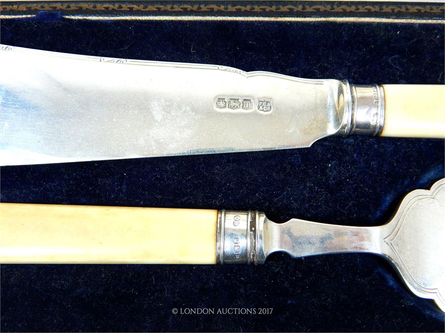 A George V cased pair of sterling silver fish servers with ivory handles - Image 2 of 2