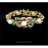 A yellow gold (tested as 18 ct), diamond, emerald and baroque pearl bracelet