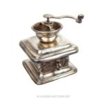 An Edwardian novelty miniature sterling silver coffee grinder