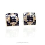 A pair of 14 ct white gold, diamond and sapphire set stud earrings