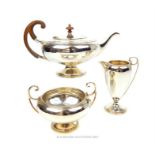 A hallmarked silver three piece tea set